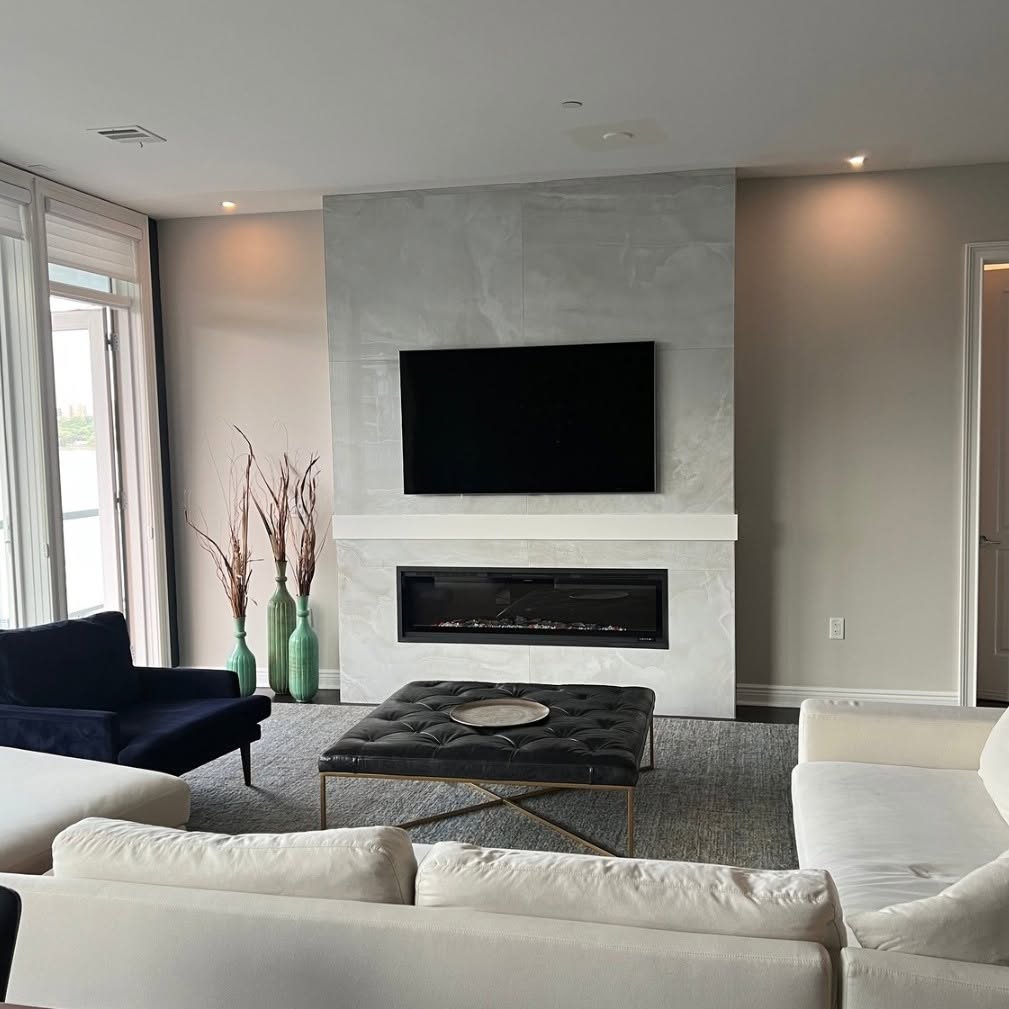 Stone media wall with linear fireplace