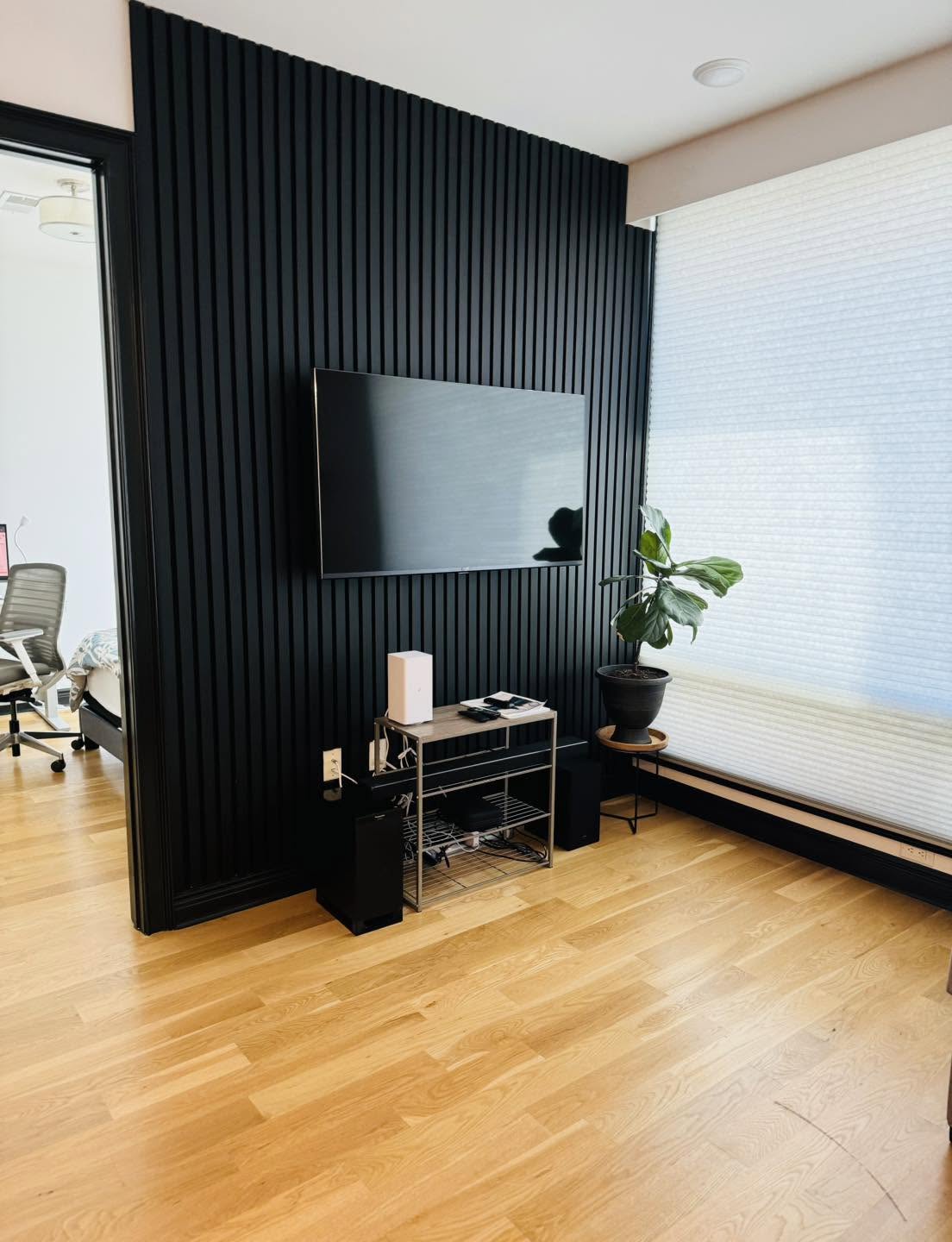 Finished slat wall with mounted display